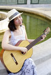 young woman with guitar