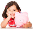 Little girl saving money