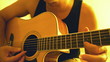 Man playing acoustic guitar with warm light Man playing acoustic guitar with warm light