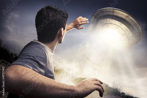 Photo: Man about to be abducted by aliens Man about to be abducted by aliens