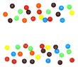 lots of colorful candies spread on white background