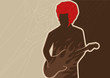 Silhouette of a man with guitar.