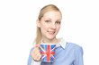 Young Caucasian woman with a cup of England