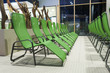 Photo: several green swimming bath sun lounger arranged in a row several green swimming bath sun lounger arranged in a row