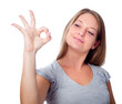 the girl shows gesture of approval to something