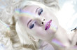 Closeup portrait  beautiful woman with rainbow