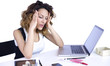 Woman with headache at the desk