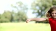 four children jumping outdoor and having fun