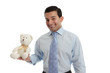 Photo: Man holding a knitted teddy bear Man holding a knitted teddy bear