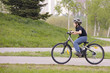 Boy cycling in park