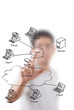 Businessman pushing LAN diagram on the whiteboard. Businessman pushing LAN diagram on the whiteboard.