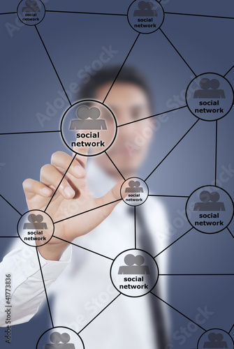 Photo: Businessman write Social Network diagram. Businessman write Social Network diagram.