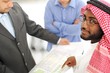 Architects at Middle east discussing engineering design project