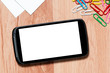 smartphone  on a desk with clipping paths for the screen