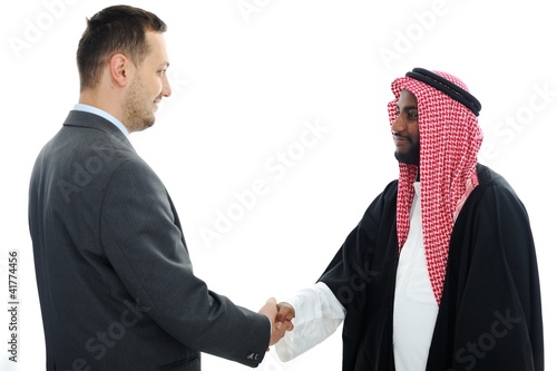 Photo: Sheikh making a deal with caucasian businessman Sheikh making a deal with caucasian businessman