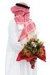 Foto: Middle eastern man hides behind a roses for his wife Middle eastern man hides behind a roses for his wife