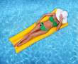 Woman relaxing in a pool