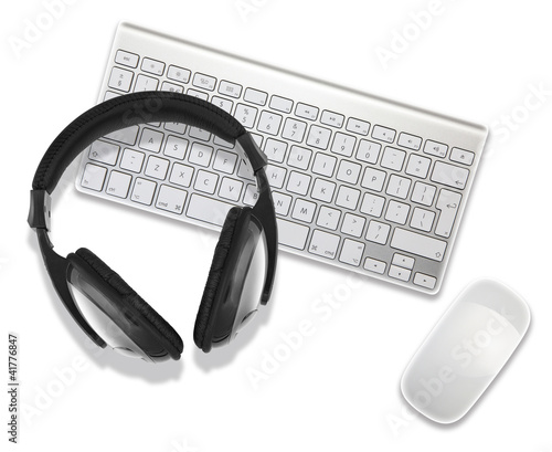 Photo: headphones on desktop computer headphones on desktop computer