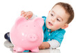 Saving money in a piggybank