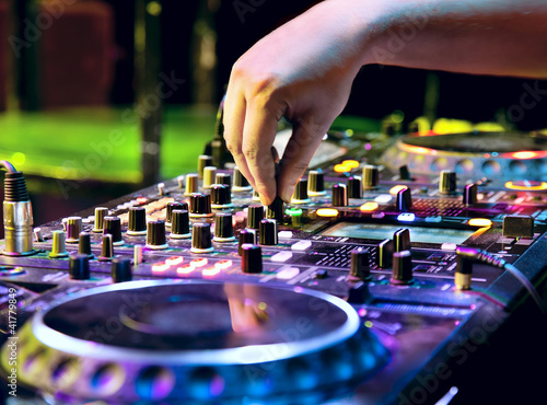 Photo: Dj mixes the track Dj mixes the track