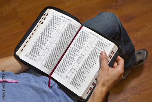 Photo: A man reads the Bible A man reads the Bible