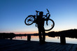 Photo: Silhouette of a Cyclist on the Sunset Sky Silhouette of a Cyclist on the Sunset Sky