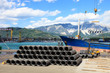 iron wire in harbor with forklift and ship iron wire in harbor with forklift and ship