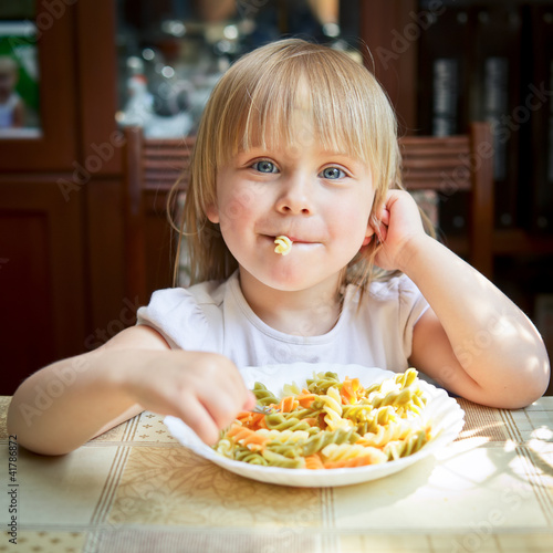 Photo: Child with pasta Child with pasta