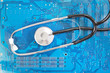 Stethoscope on background motherboard. Diagnostic.