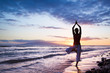 Silhouette of a beautiful Yoga woman