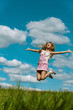 young woman close-up jumping