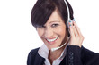Sympatische Call Center Mitarbeiterin, Frau lächelt mit Head Set Sympatische Call Center Mitarbeiterin, Frau lächelt mit Head Set