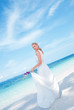 Beautiful bride  on tropical sea side background