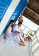 Romantic young couple in tropical beach house