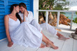 Romantic young couple in tropical beach house