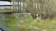View from high-speed train window on a deserted suburb