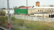 The View from express train window to industrial zones