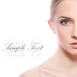 Beautiful woman with clean face over white background