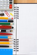 back to school concept and checked notebook on wood background back to school concept and checked notebook on wood background