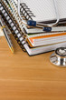 medical stethoscope with notebook on wood medical stethoscope with notebook on wood