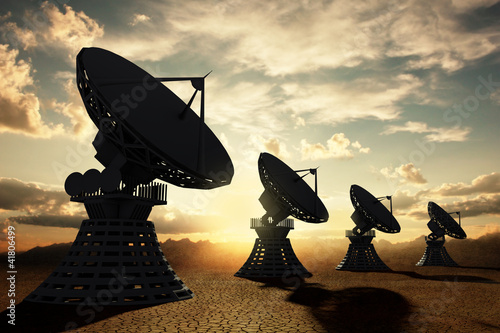 Illustration: Radiotelescopes silouette at sunset Radiotelescopes silouette at sunset