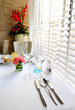 Kitchenware set on the table with decorated flower Kitchenware set on the table with decorated flower