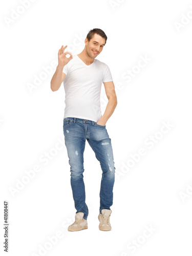 Photo: handsome man showing ok sign handsome man showing ok sign