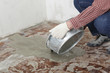 Construction worker pouring wet concrete