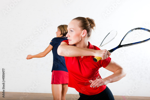Photo: Squash racket sport in gym Squash racket sport in gym