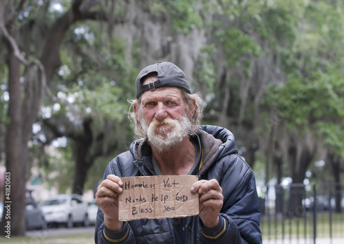 Photo: Homeless man holding sign Homeless man holding sign
