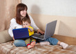 Happy mother and child with laptops Happy mother and child with laptops