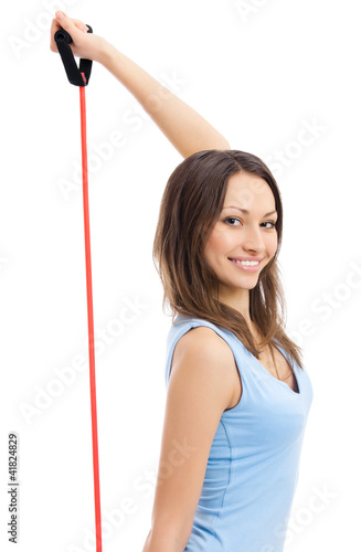Foto: Woman with fitness expander, on white Woman with fitness expander, on white