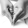 Photo: baby holding mother hand baby holding mother hand