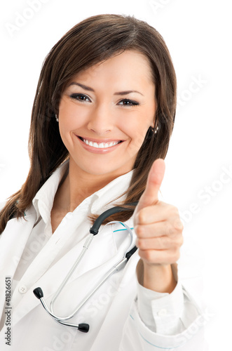 Foto: Doctor with thumbs up gesture, over white Doctor with thumbs up gesture, over white